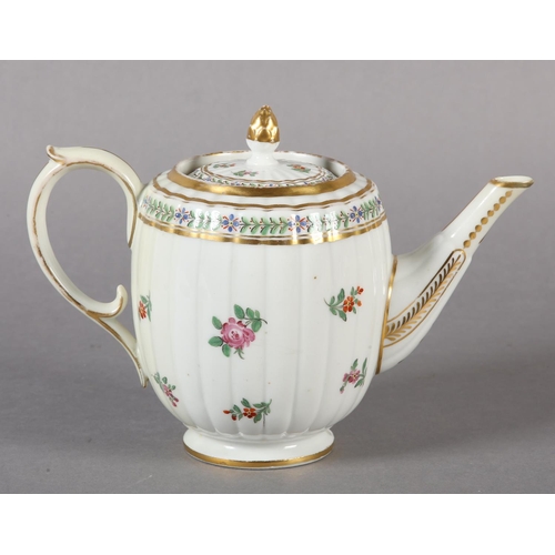 104 - AN 18TH CENTURY TEAPOT, the lid having an acorn gilt finial, the fluted body of barrel shape painted... 