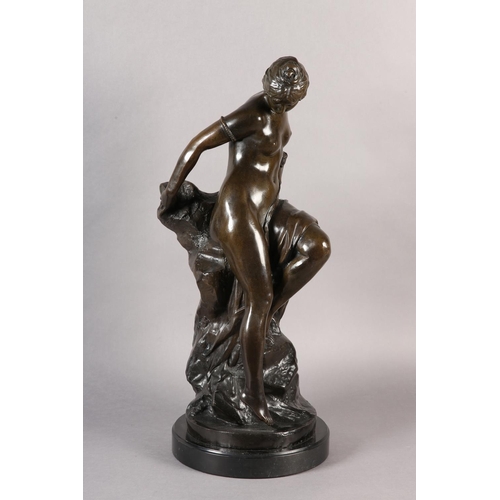 65 - AFTER FERDINAND LEPCKE GERMAN (1866-1905), A bronze sculpture of a nude female, partially draped, st... 