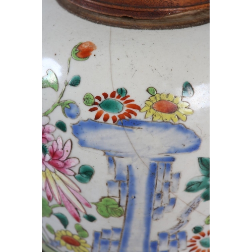 121 - AN 18TH CENTURY CHINESE FAMILLE ROSE GINGER JAR, the ovoid body painted with chrysanthemum and peony... 