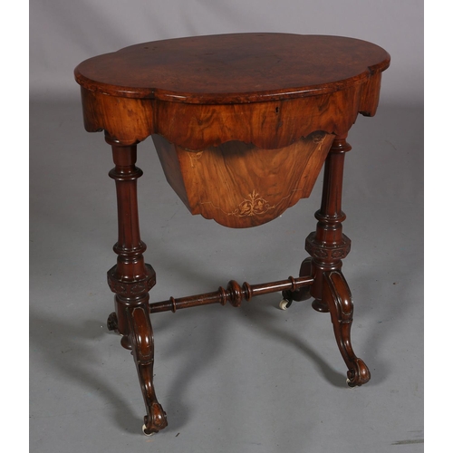 396 - A VICTORIAN FIGURED WALNUT WORK TABLE, of quatrefoil outline, quarter veneered with central panel, b... 