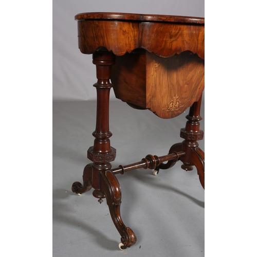 396 - A VICTORIAN FIGURED WALNUT WORK TABLE, of quatrefoil outline, quarter veneered with central panel, b... 