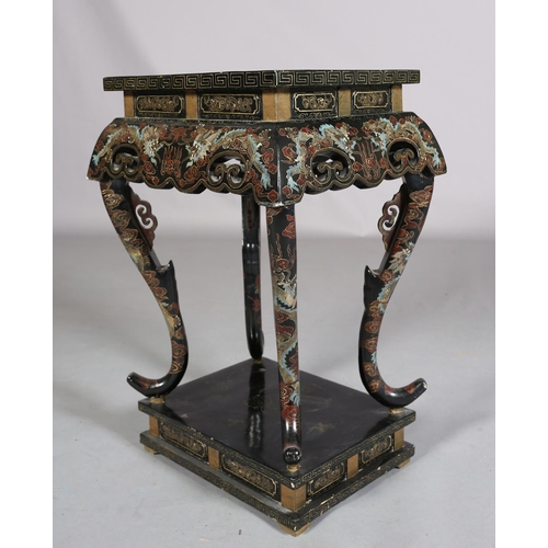 112 - A CHINESE BLACK LACQUERED TABLE OR STAND, Qing, the rectangular top painted in iron red, green blue ... 