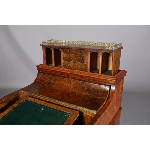 392 - A VICTORIAN FIGURED WALNUT DAVENPORT, having a pierced gilt metal gallery, pop-up back fitted with t... 