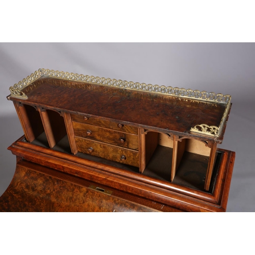 392 - A VICTORIAN FIGURED WALNUT DAVENPORT, having a pierced gilt metal gallery, pop-up back fitted with t... 