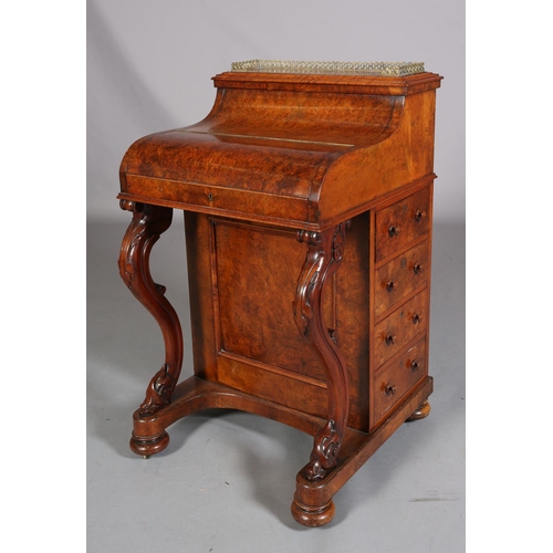 392 - A VICTORIAN FIGURED WALNUT DAVENPORT, having a pierced gilt metal gallery, pop-up back fitted with t... 