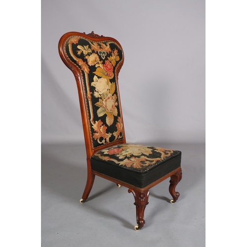 393 - A VICTORIAN WALNUT PRIE DIEU CHAIR, having an encircling frame with foliate cresting, original flora... 