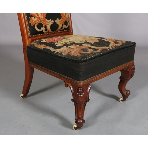 393 - A VICTORIAN WALNUT PRIE DIEU CHAIR, having an encircling frame with foliate cresting, original flora... 