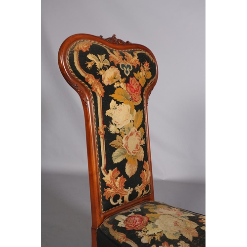 393 - A VICTORIAN WALNUT PRIE DIEU CHAIR, having an encircling frame with foliate cresting, original flora... 