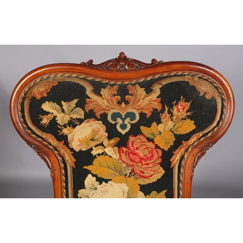 393 - A VICTORIAN WALNUT PRIE DIEU CHAIR, having an encircling frame with foliate cresting, original flora... 