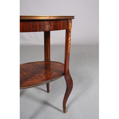 420 - A FRENCH MAHOGANY CROSSBANDED AND PARQUETRY TWO TIER TABLE WITH GILT METAL MOUNTS, of oval outline, ... 