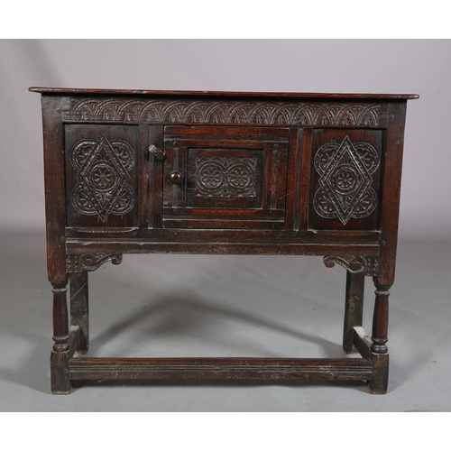 359 - AN OAK CUPBOARD OF 17TH CENTURY STYLE, of narrow proportions, gouge cut ends to the top, above a dem... 