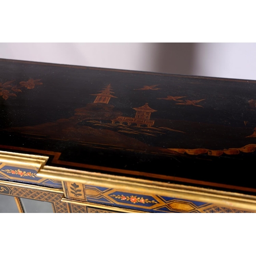 388 - AN EBONISED AND GILT CHINOISERIE BREAKFRONT BOOKCASE CABINET, the top gilded with island vignette ab... 