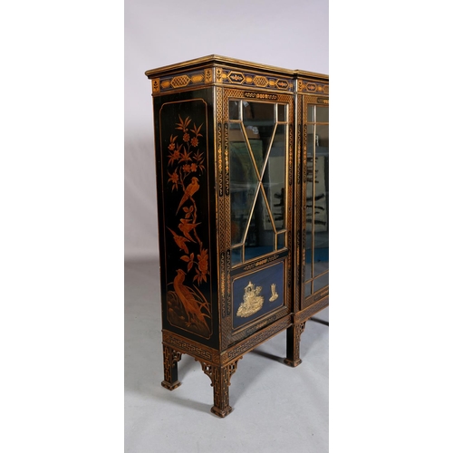 388 - AN EBONISED AND GILT CHINOISERIE BREAKFRONT BOOKCASE CABINET, the top gilded with island vignette ab... 