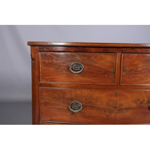 378 - A GEORGE III MAHOGANY BOWFRONT CHEST of two short and two long cockbeaded drawers, brass oval back p... 