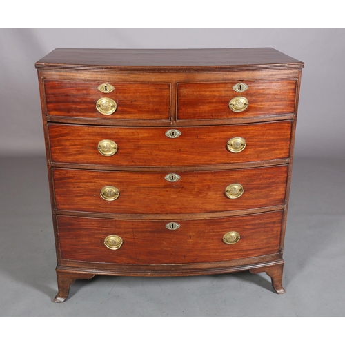 380 - A LATE GEORGE III MAHOGANY BOW FRONTED CHEST of two short and three long graduated cockbeaded drawer... 