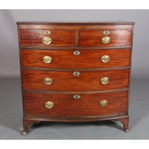 380 - A LATE GEORGE III MAHOGANY BOW FRONTED CHEST of two short and three long graduated cockbeaded drawer... 