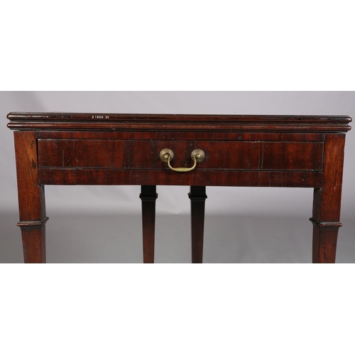 410 - AN 18TH CENTURY MAHOGANY CARD TABLE, possibly Irish, having a rectangular fold over top, the interio... 