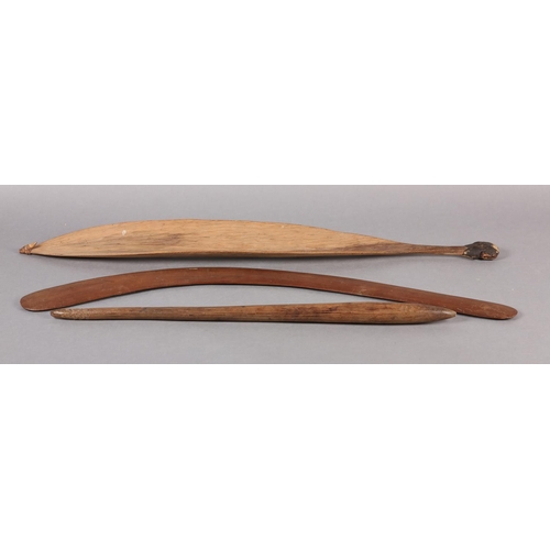 15 - A COLLECTION OF ABORIGINAL ITEMS comprising a spear thrower / woomera 78.5cm, an Aboriginal tapered ... 