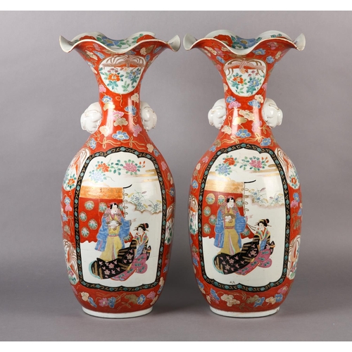 132 - A PAIR OF JAPANESE KUTANI VASES, with flared frilled rims, having twin handles formed as white rabbi... 