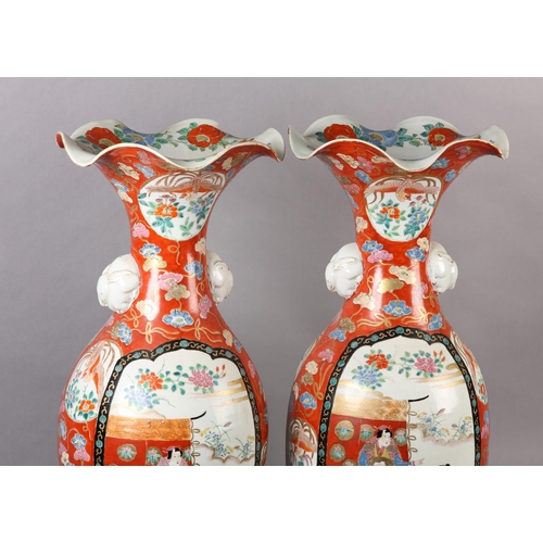 132 - A PAIR OF JAPANESE KUTANI VASES, with flared frilled rims, having twin handles formed as white rabbi... 