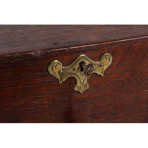 33 - A 19TH CENTURY OAK BOX, having period strap hinges with engraved brass escutcheon and key, 38cm wide... 