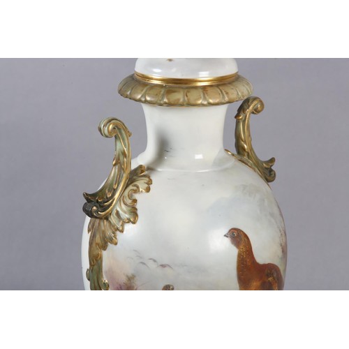 89 - A ROYAL WORCESTER CHINA WORKS TWO HANDLED PEDESTAL VASE, the ovoid body painted with Red Grouse in m... 