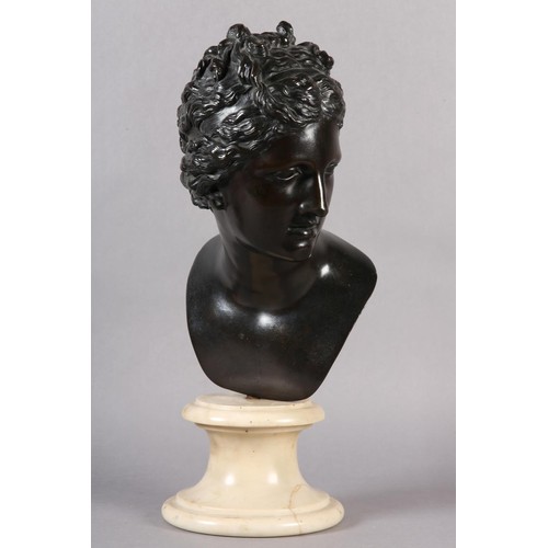 64 - AN 19TH CENTURY BRONZE BUST OF A CLASSICAL FEMALE, after the antique, on marble socle, 49cm high