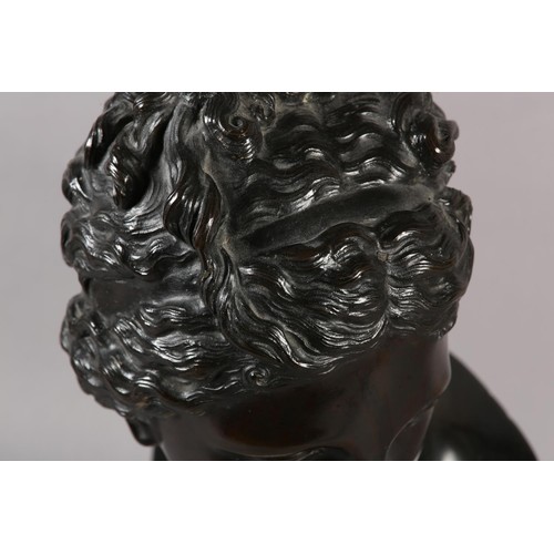 64 - AN 19TH CENTURY BRONZE BUST OF A CLASSICAL FEMALE, after the antique, on marble socle, 49cm high