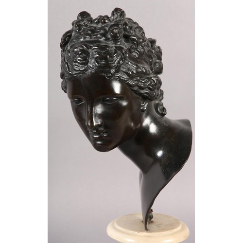 64 - AN 19TH CENTURY BRONZE BUST OF A CLASSICAL FEMALE, after the antique, on marble socle, 49cm high