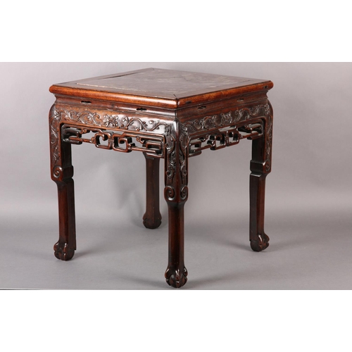 113 - A CHINESE HARDWOOD AND MARBLE INSET URN STAND, of square outline, the apron and upper leg carved wit... 