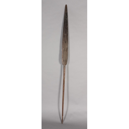 16 - A TRIBAL PADDLE with carved and pierced decoration, 181cm