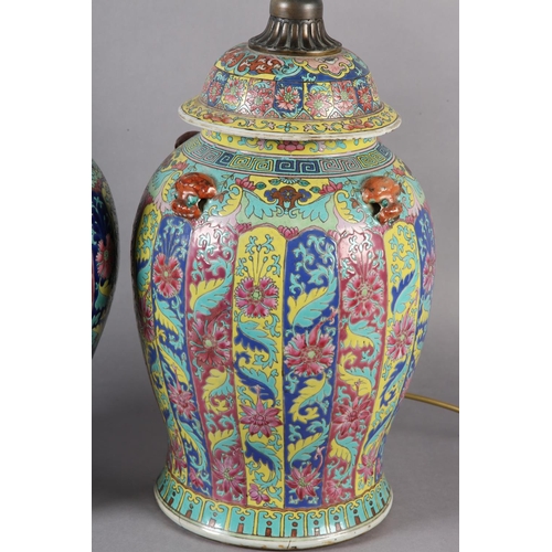 119 - A MATCHED PAIR OF CHINESE FAMILLE ROSE VASES AS TABLE LAMPS, Qing, having domed cover, with applied ... 