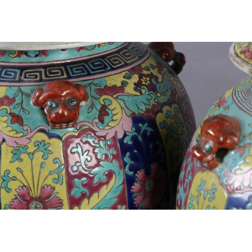 119 - A MATCHED PAIR OF CHINESE FAMILLE ROSE VASES AS TABLE LAMPS, Qing, having domed cover, with applied ... 