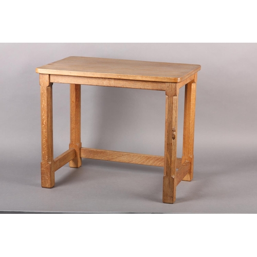 349 - THOMPSON OF KILBURN 'MOUSEMAN', An oak occasional table, rectangular on an octagonal and square fram... 