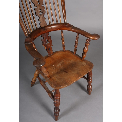 361 - A MID 19TH CENTURY YEW-WOOD WINDSOR HIGH BACK ARMCHAIR, having a pierced and scrolled profile splat ... 