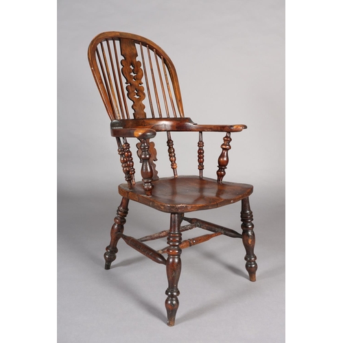 368 - A 19TH CENTURY YEW-WOOD WINDSOR HIGH BACK ARMCHAIR, having a pierced and scrolled profile, broad arm... 