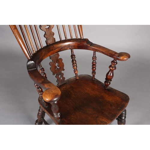 368 - A 19TH CENTURY YEW-WOOD WINDSOR HIGH BACK ARMCHAIR, having a pierced and scrolled profile, broad arm... 