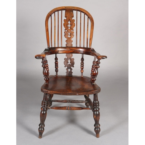 368 - A 19TH CENTURY YEW-WOOD WINDSOR HIGH BACK ARMCHAIR, having a pierced and scrolled profile, broad arm... 