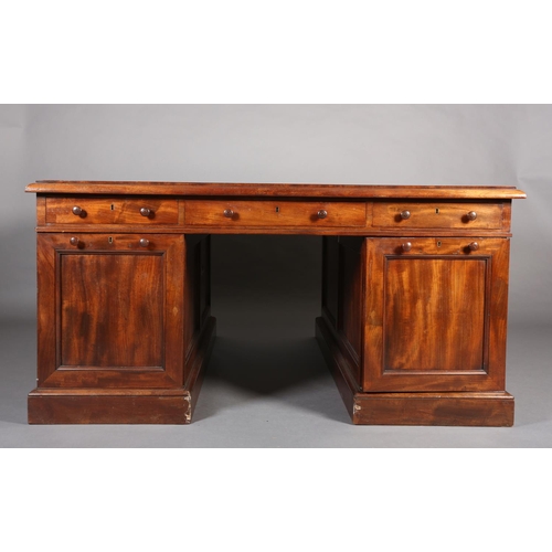 371 - A 19TH CENTURY FIGURED MAHOGANY PARTNER'S DESK, c1830, having a green leather incised writing surfac... 