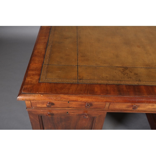 371 - A 19TH CENTURY FIGURED MAHOGANY PARTNER'S DESK, c1830, having a green leather incised writing surfac... 