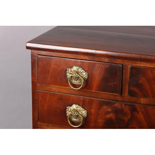 373 - A MID 19TH CENTURY FIGURED MAHOGANY NEST of two short and three long graduated drawers, with gilt me... 