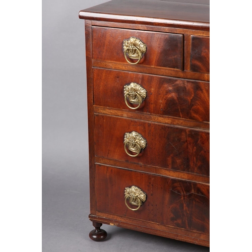 373 - A MID 19TH CENTURY FIGURED MAHOGANY NEST of two short and three long graduated drawers, with gilt me... 