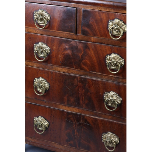 373 - A MID 19TH CENTURY FIGURED MAHOGANY NEST of two short and three long graduated drawers, with gilt me... 