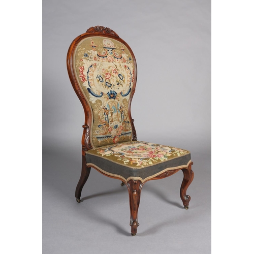 384 - A VICTORIAN ROSEWOOD PRIE DIEU CHAIR, having an encircling frame with flower and leaf cresting, need... 