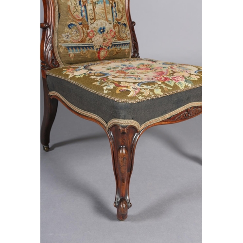 384 - A VICTORIAN ROSEWOOD PRIE DIEU CHAIR, having an encircling frame with flower and leaf cresting, need... 