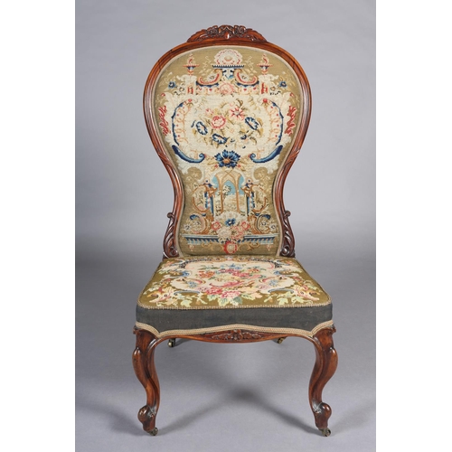 384 - A VICTORIAN ROSEWOOD PRIE DIEU CHAIR, having an encircling frame with flower and leaf cresting, need... 