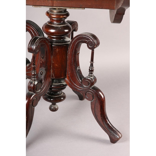 402 - A LATE 19TH CENTURY MAHOGANY REVOLVING PIANO STOOL, the dished seat with open curved upright arms, t... 