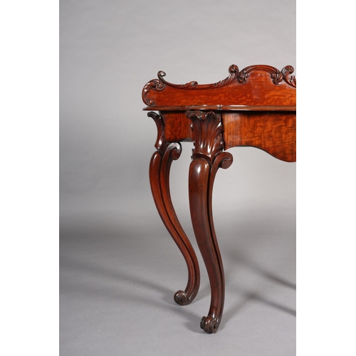 408 - A MID 19TH CENTURY MAHOGANY HALL TABLE of serpentine outline, having a raised back moulded with leaf... 