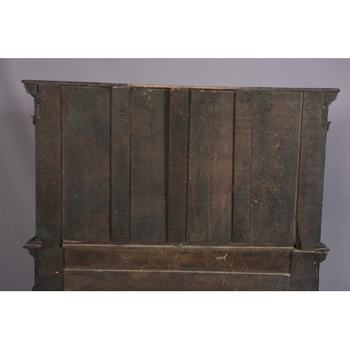 358 - A 17TH CENTURY JOINED OAK COURT CUPBOARD, having a foliate carved cornice, the frieze inlaid in ebon... 