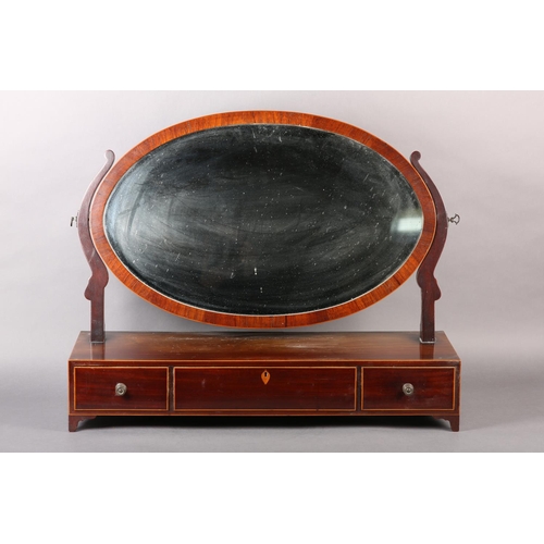 400 - AN EARLY 19TH CENTURY MAHOGANY AND BOX WOOD LINE INLAID TOILET MIRROR, having an oval glass, serpent... 